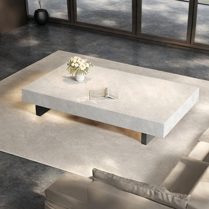 Simple rectangular rock slab floating coffee table