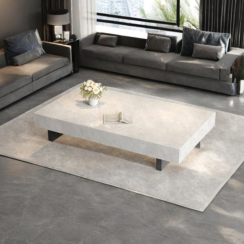 Simple rectangular rock slab floating coffee table