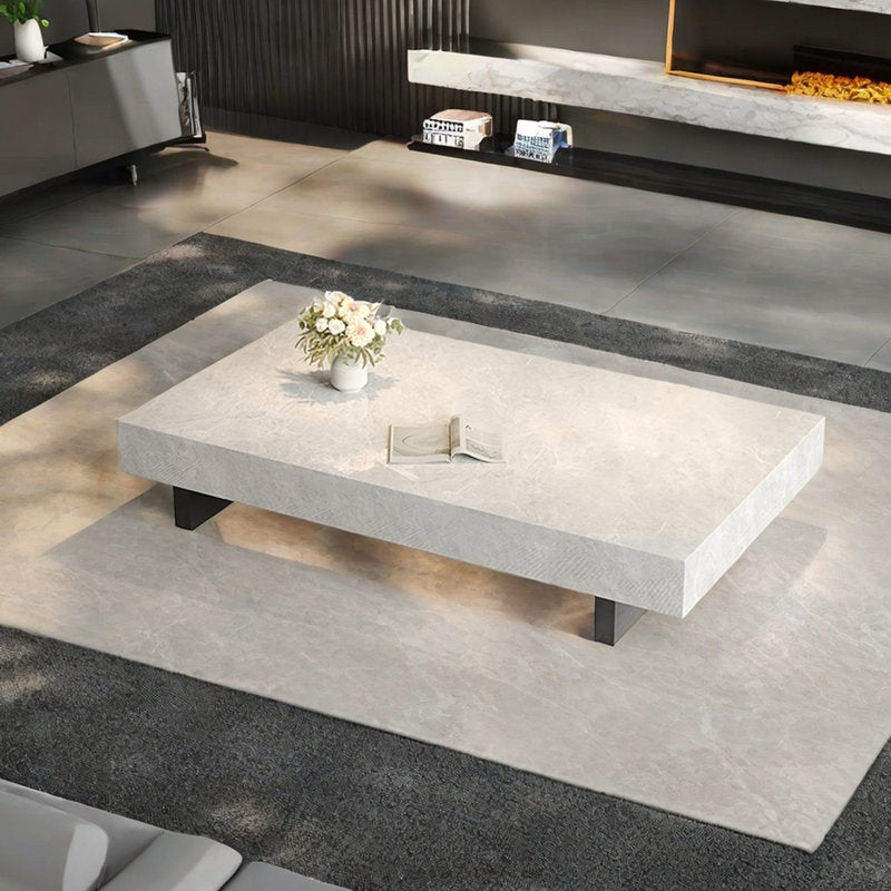 Simple rectangular rock slab floating coffee table